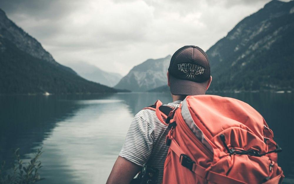 A traveller exploring a destination with a backpack